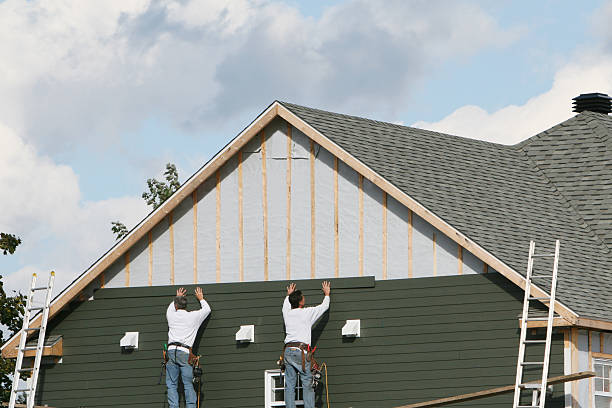 Professional Siding technician working in Dover, OH